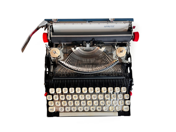 Refreshed Royal Sprite Portable Manual Typewriter in Blue