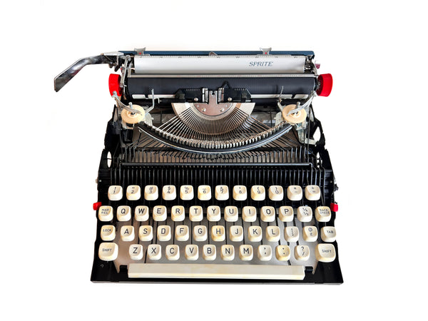 Refreshed Royal Sprite Portable Manual Typewriter in Blue