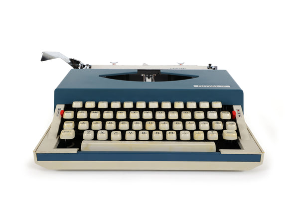 Refreshed Royal Sprite Portable Manual Typewriter in Blue
