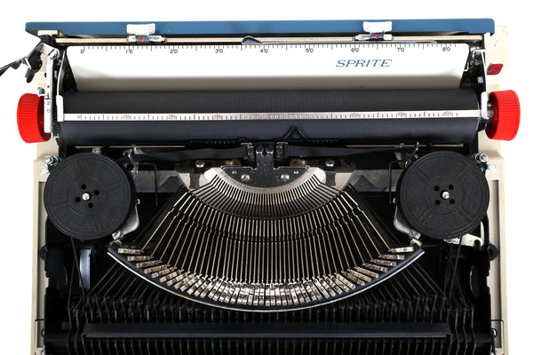 Refreshed Royal Sprite Portable Manual Typewriter in Blue